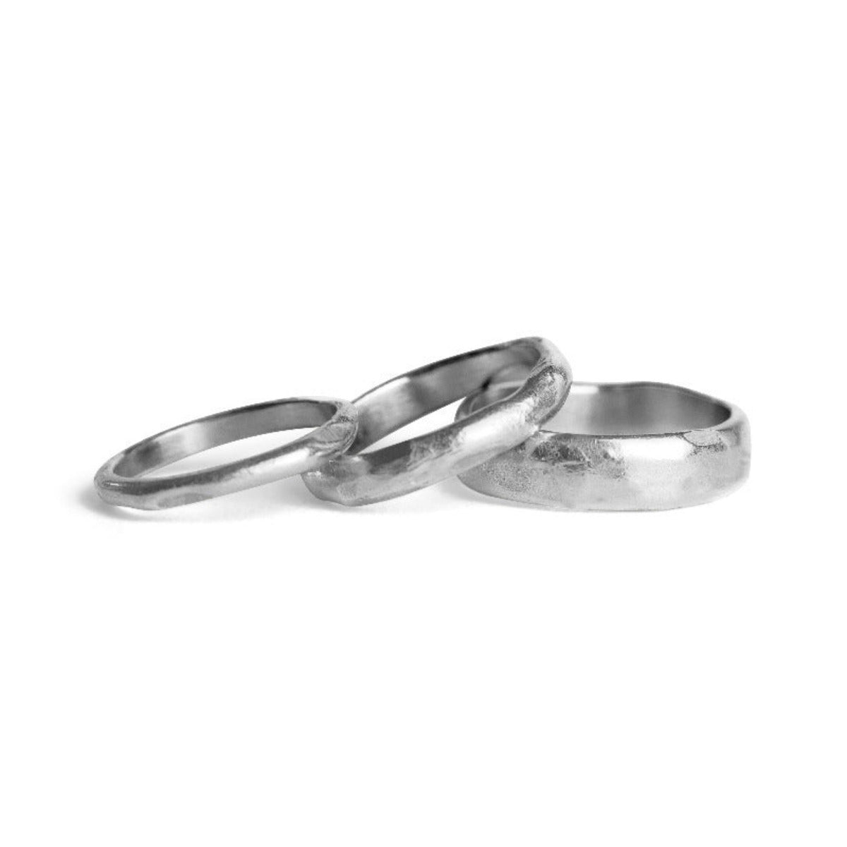 Two silver rings on a white background